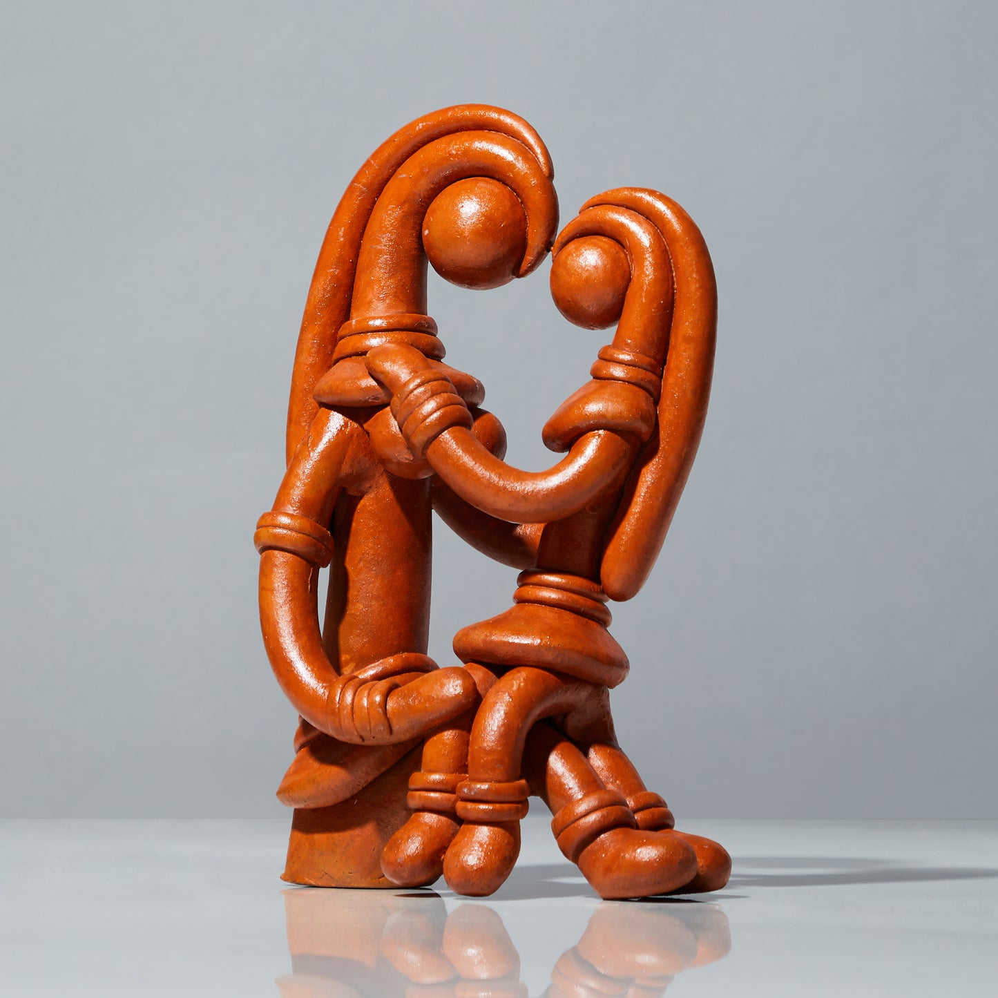 Terracotta sculpture, terracotta decor, Mother and child sculpture (option 1), angled view