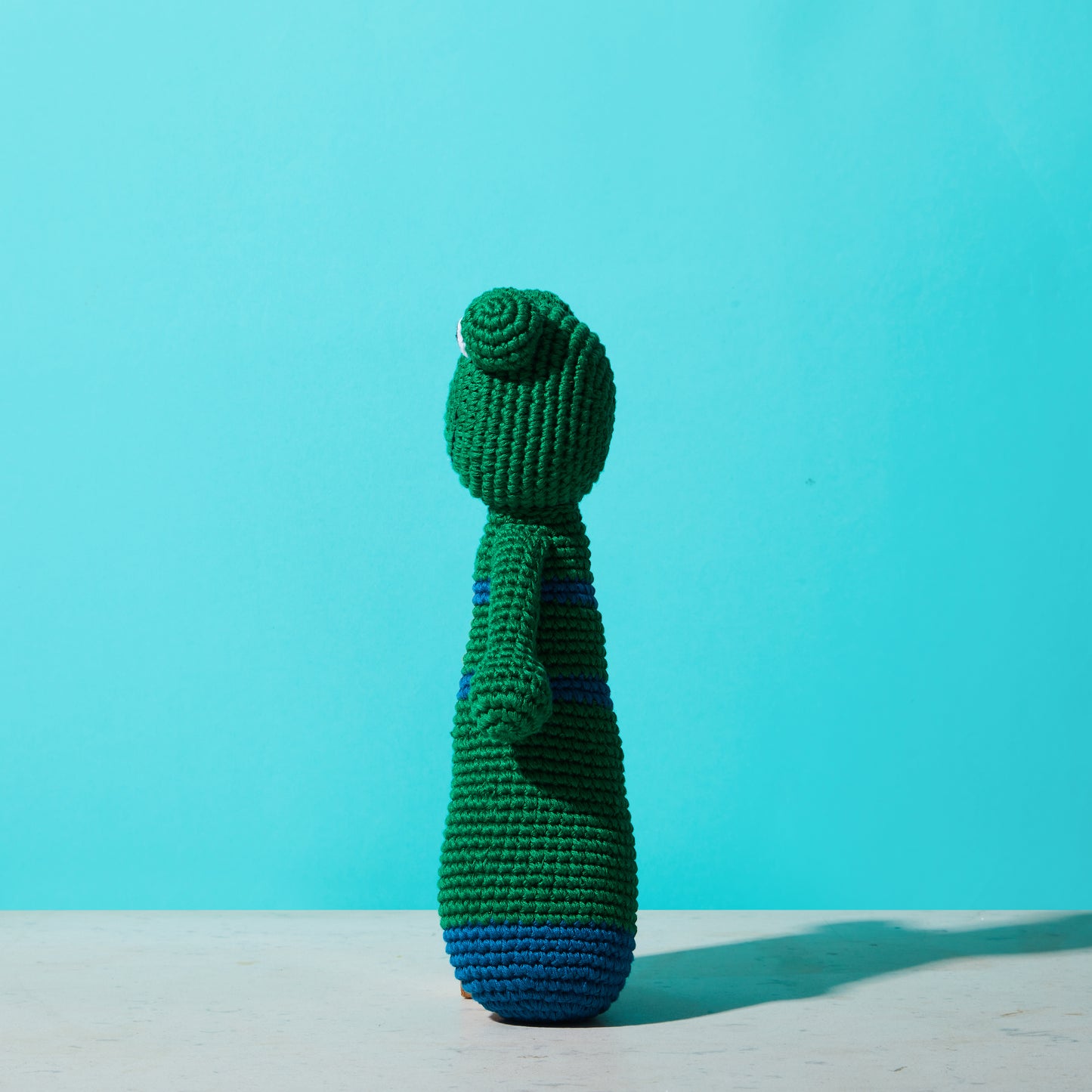 crochet toy, children's toy, crochet stuffed toy, frog-sleep buddy, side view