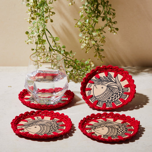 Crochet Madhubani Fish Coaster, crochet decor, coasters. set of four side view